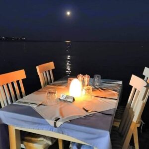 A table at a restaurant with moonlight
