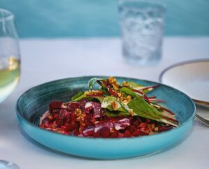 A beetroot salas on a blue plate